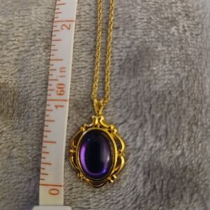 Gold-Tone Pendant Necklace with Purple Oval Cabochon